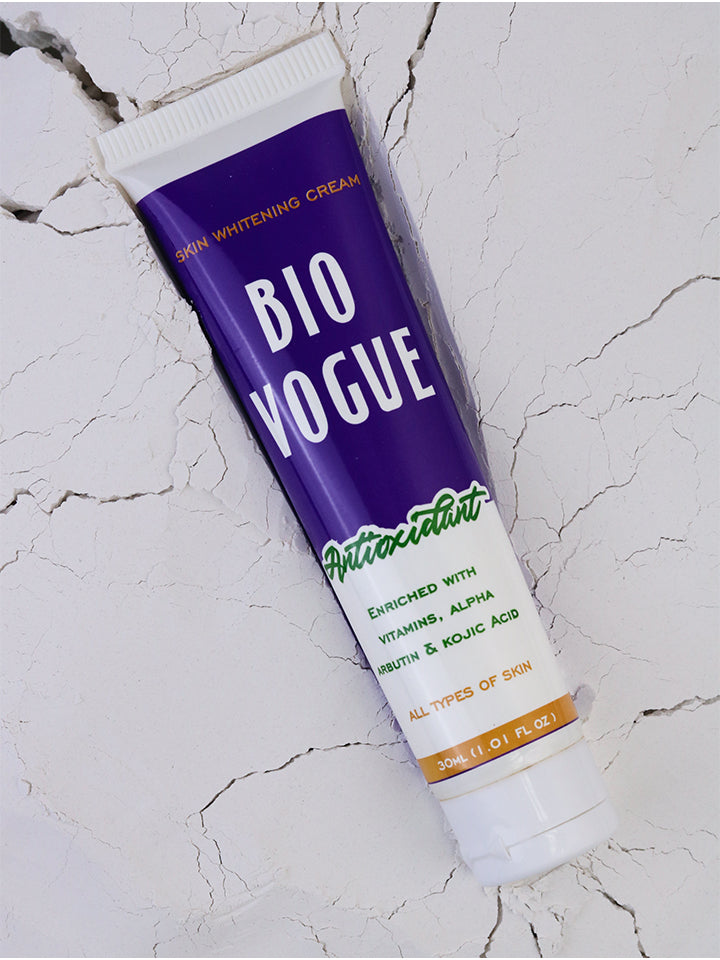 Tube of Bio Vogue skin whitening cream on a textured white background