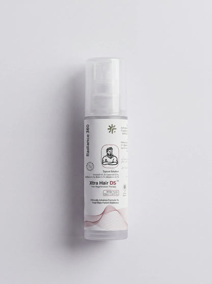 Skincare bottle labeled 'Xtra Hair DS' on a light gray background