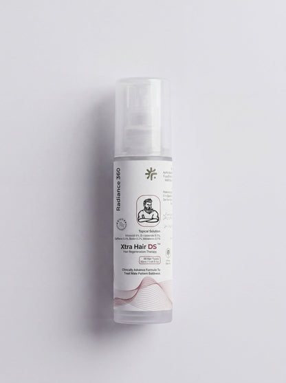 Skincare bottle labeled 'Xtra Hair DS' on a light gray background